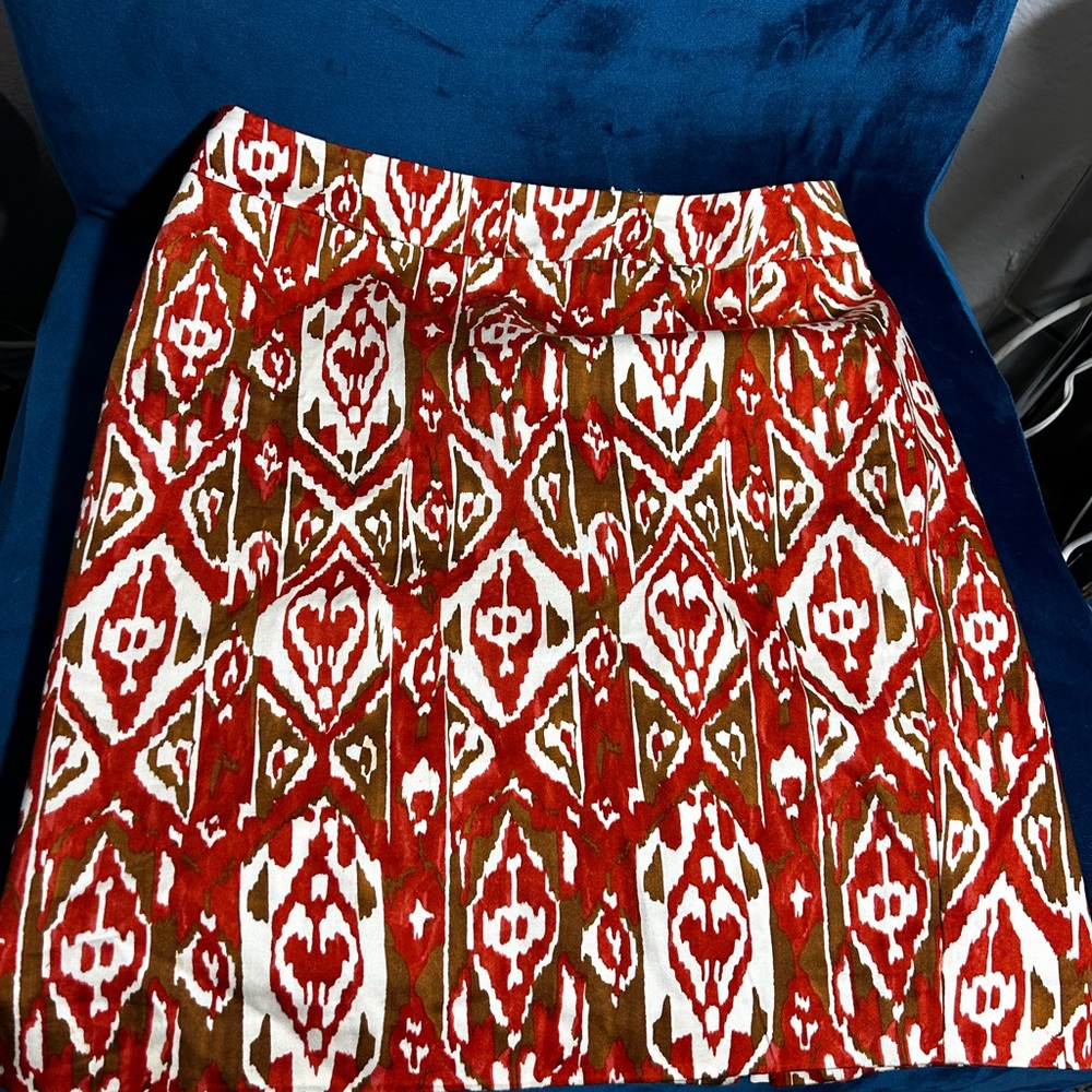 Valerie Bertinelli White and Orange Pleated Mini Skirt